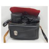 Group of 4 camera lenses in camera bag