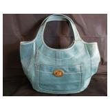 Designer style handbag marked coach