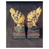 A pair of mid century Halrloquins bookends