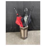 Red, black and gray, and black umbrella with