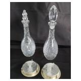 Group of glass decanters and coasters