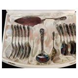 Silver tone Rose pattern flatware set