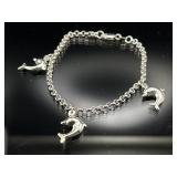 Sterling silver dolphin charm bracelet, 6.65g