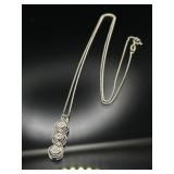 Sterling silver necklace with triple tier pendant