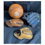 Baseball gloves, basketball in box lot