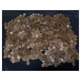 Group of wheat pennies in a canvas bag