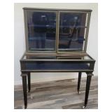 Antique French vitrine with brass trimmings