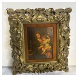 old wood framed print of Madonna and baby