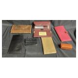 6 leather and faux leather wallets . Buxton,