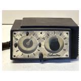 Vintage Silvertone alarm clock radio