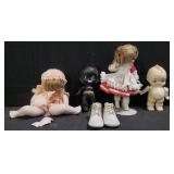 Group of dolls in clear tub one as is