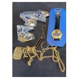 Globe keychains,  watch, etc in pb in cabinet