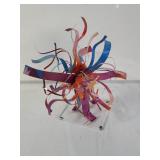 Signed moder tin sculpture on a lucite base