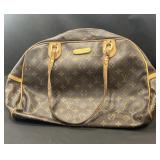 Designer style handbag marked Louis Vuitton
