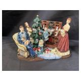 Christmas family around Christmas tree and fire