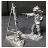 Signed pewter figurine of boy painting, w/dog