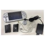 Portable PlayStation with charger, case,