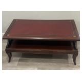 Antique leather top coffee table