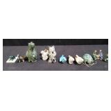 Group of miniature figurines in blue pencil case