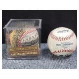 Pair of baseballs one signed and one commemorative