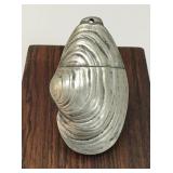 Antique silver metal oyster shell match