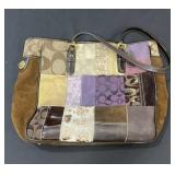 Designer style handbag marked Coach