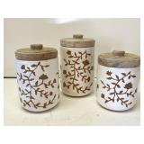 Three Pier 1 hand painted terracotta canisters