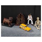 Bookends, toy car, etc. Box lot