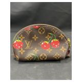 Designer style wallet marked Louis Vuitton