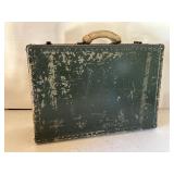 Vintage green metal suitcase
