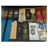 Collection of 12 antique medals and badges