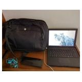 Apple MacBook laptop computer. Black. Battery is