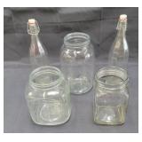 Group of vintage glass gars & two tall bottles /