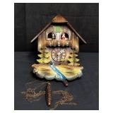 Cuckoo clock, 9" l. x 5 1/2" w. x 12" h.
