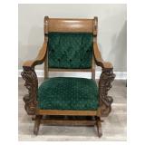 Antique rocking chair on wheels