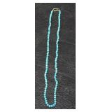Unpolished turquoise necklace with 10kt Gold