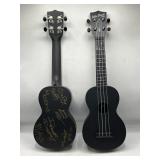 Pair of Kala ukuleles signed by Disney park