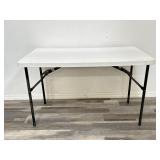 Collapsable white folding table