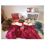 Box of Christmas ornaments, stockings, garland,