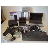 Box of HP laptop, portable DVD player, computer
