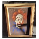 Vintage oil on velvet of a clown singed by