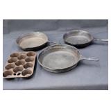 3 vintage cast iron skillets & one muffin pan