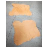 Pair of tan leather pieces