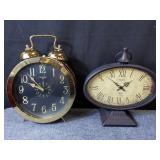 Pair of battery operated clocks