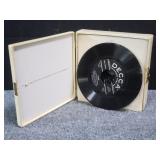 Group of 45rpm records in case