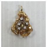 Diamond & 14kt gold pendant weight 2.9grams pb