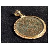 Jewelry: 18 KT gold framed bronze coin pendant, 1