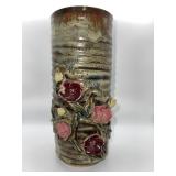 Vintage glazed pottery vase with flowers