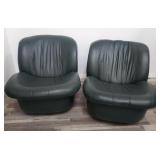 Pair of leather swivel tilt scoop chairs
