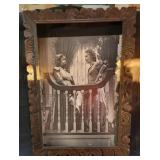 Vintage poster on board in old wooden frame /